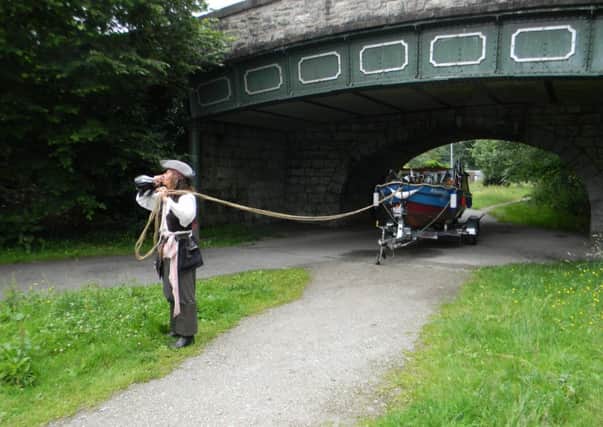 The captain is convincingly played by Laurraine Smith, a Morecambe photographer. Friends of Lancaster canal.
