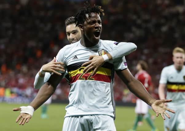 Belgium's Michy Batshuayi celebrates after scoring his side's second goal during the Euro 2016 round of 16 soccer match between Hungary and Belgium, at the Stadium municipal in Toulouse