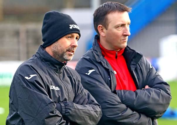 Phil Brown and assistant Dave McCann.