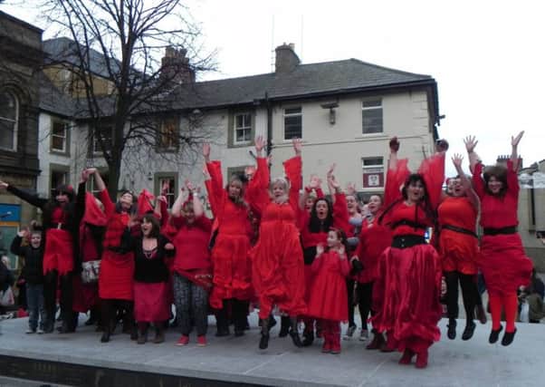 Kate Bush-themed dancers appear for a 'flash mob' in Market Square, Lancaster in 2015.