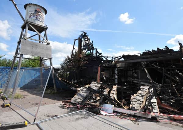 Damage to the Ranch House after Friday's fire. Photo by Neil Cross.