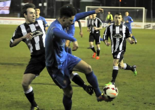 Louis Mayers in action for Clitheroe.