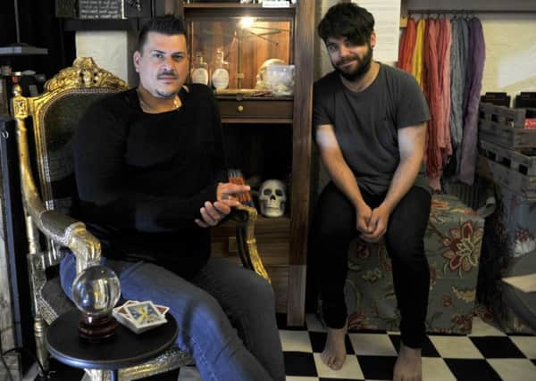 Dubhlainn Earley and Marcus Baron inside Lancaster's first witchcraft shop on Sun Street