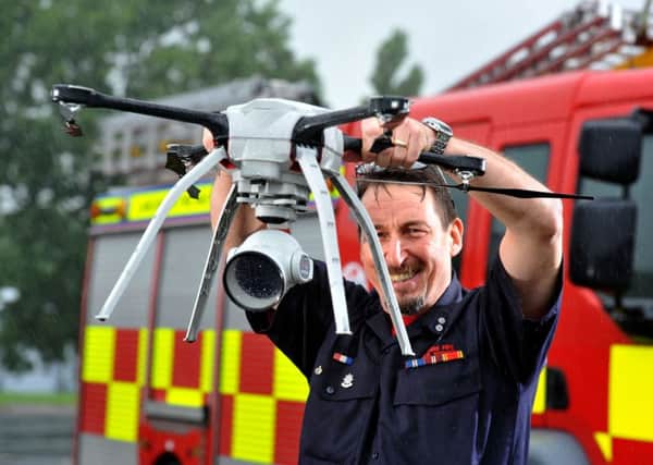 Photo Neil Cross
A drone is set to be used to assist police and firefighters in Lancashire thanks to a new collaboration between fire and police
Ian Hainsworth with the drone