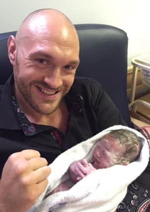 Tyson Fury with his new baby son.