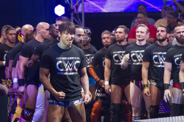 Jack Gallagher lines up with his fellow WWE Cruiserweight Classic competitors.