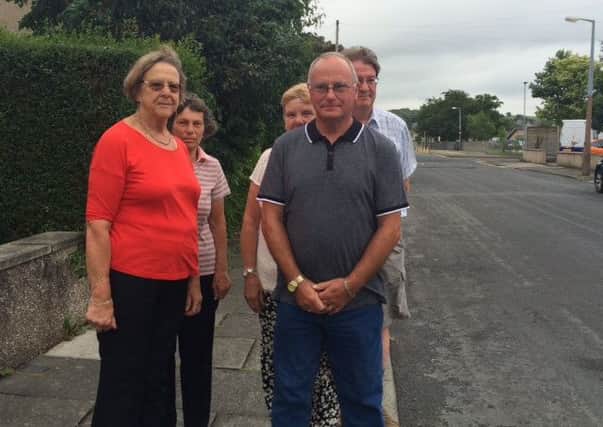 From left: Beaufort Road residents Glenys Dennison, Pauline Nutt, Ray Stallwood, Sandra Stallwood and Coun Roger Dennison. The residents started a petition calling for more traffic signs or traffic calming measures on Beaufort Road to prevent an accident.