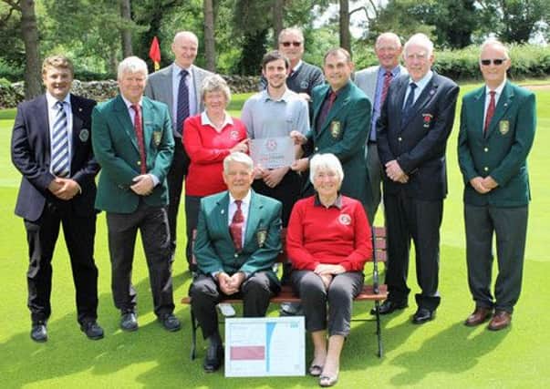 Silverdale GC receives its GolfMark award (left to right, back row) Sam Matthews (Head Professional), Keith Cordukes (President), Peter Palmer (Vice Captain), Christine Birchall (Ladies Captain), Adam McAlister (County Development Officer, Lancashire Golf Development Group), Stuart Freeman (H&S Officer), Phillip Mashiter (Captain), David Crayston (Past Captain), Norman Forrest (Patron) and Jerry Martin (Manager) with (seated) Roger Sharples (Past Captain) and Sue Crayston (Ladies Secretary)