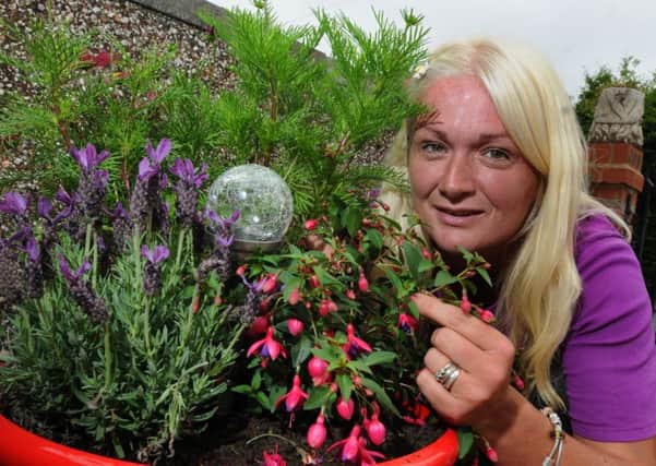 MORECAMBE  18-07-16
Kathryn Metcalfe from Morecambe, has set up her own gardening business.