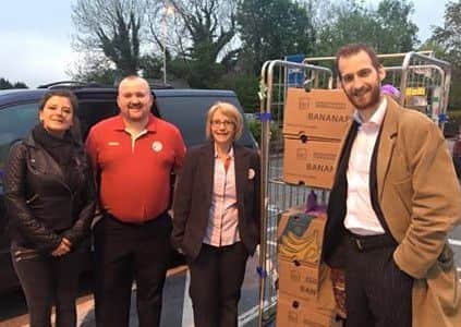 Mark Cutter with staff from Tesco in Carnforth and their recent delivery.
