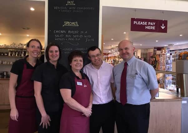 Country Harvest staff Harriet Phillipson, Joanne Mackay and Janet Tyrer with Sam Woodhouse and owner Mike Clark.