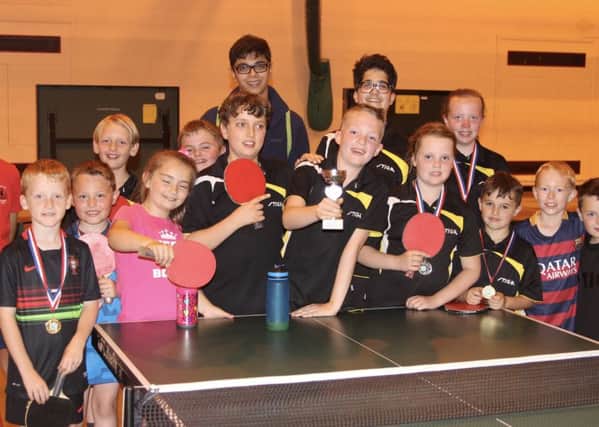 Some of the players at the recent open table tennis tournament.