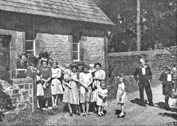 a Sunday congregation at Roeburndale Methodist Chapel, circa 1946. Back row (left to right): Nellie Preece, William Woodhouse. Third row: Jane Mashiter, May Woodhouse, Margaret Mashiter. Second row: Helen Woodhouse with baby Derek Lord, Dorothy Preece, Mary Woodhouse with baby Tom Preece. 
Front row: Mary Lord, Jean Lord, Isaac Woodhouse, Joseph Woodhouse.