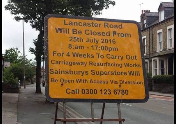 A Lancaster Road closure sign.