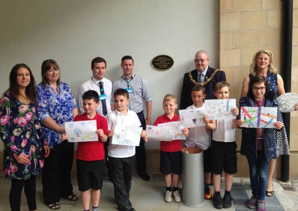 The drawing competition winners at the time capsule ceremony with judges and the Mayor of Lancaster, Coun Robert Redfurn.