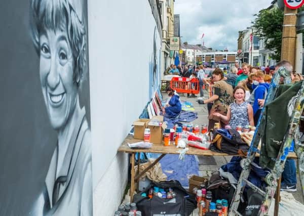 Crowds flocked to the street pARTy festival in Morecambe where they saw the new graffiti art of Victoria Wood. Picture by Bean Photo.