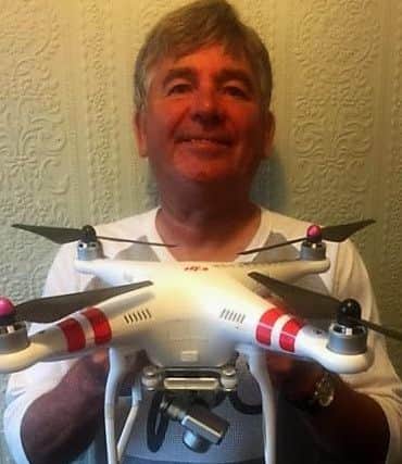 Gary Taylor with one of his drones.