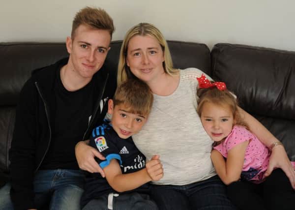 LANCASTER  01-08-16   - CANCER CARE
Kelly Morgan from Morecambe, with her family, from left, Kieran, 18, Callum, seven, and Chloe, four, right, - Kelly was diagnosed with a brain tumour and got help from CancerCare.