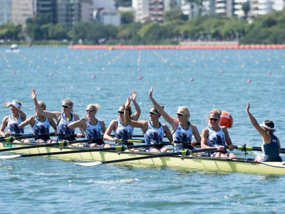 Polly Swann, third from right, celebrates silver as part of the women's eight. Picture: Intersport Images