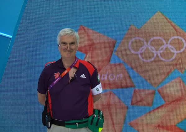 Dr John Davies, who will be volunteering as a medic at the Rio Olympics. He is pictured during his stint at the London Olympics in 2012.