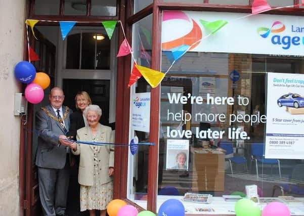 Coun Redfern, Gladys Till and Stephanie Tufft open the Age UK office.