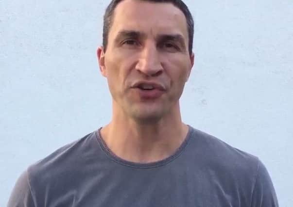 Wladimir Klitschko addresses fans in a video message.