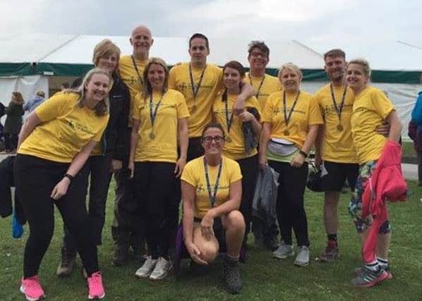 Cox Motor Group staff completing the 42 mile walk for North West Air Ambulance charity.