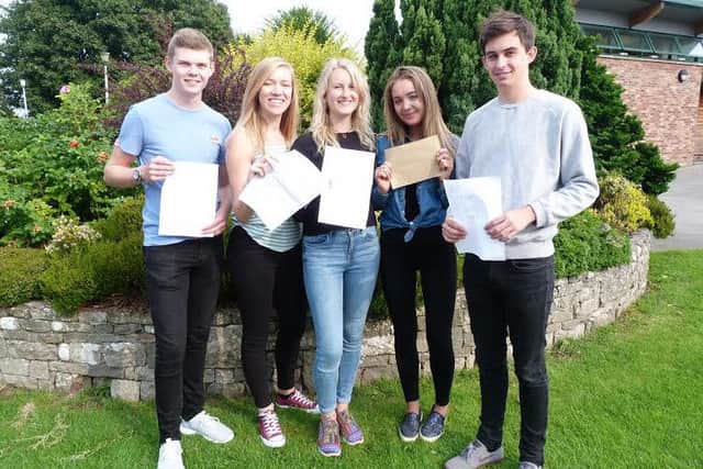 Dallam pupils Bradley Kennon, Tillie Davies, Lily Abel, Ellie Taylor and Sam Barfoot celebrate their A-level results.