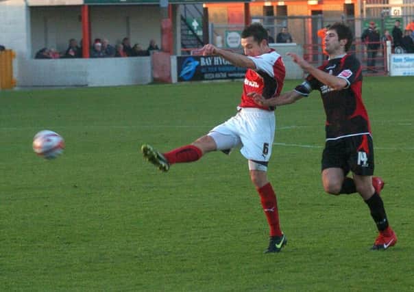 Craig Stanley scores in Morecambe's 5-0 win over Bournemouth.