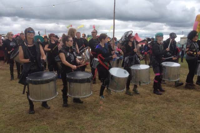 Drummers made their way through the festival site