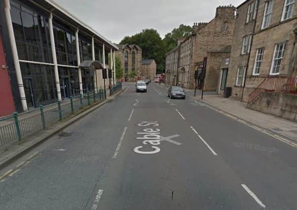 Worried members of the public called police after a man was seen lying in the middle of the road near Lancaster bus station. Picture: Google Streetview.