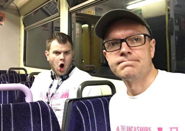 David Chandler (right) and Mike Stevens on their first train of the day from Colne as they attempt to visit all 62 railway stations in Lancashire in one day.