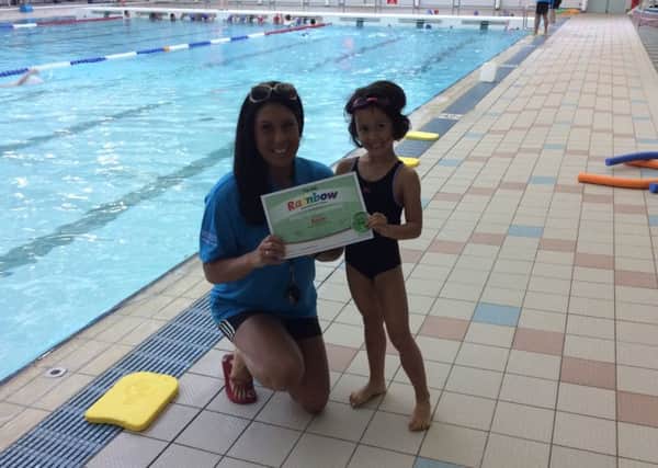 Coach Paula Reavie with five-year-old Emily Sewell at Salt Ayre Sports Centre.