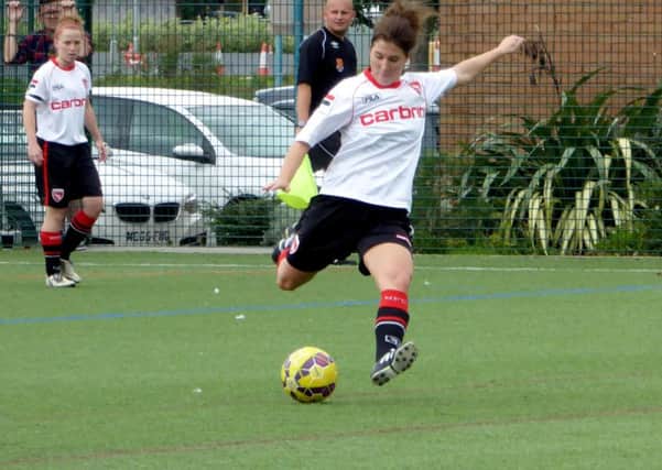Sian Mcguire in action for Morecambe Ladies against Mossley Hill LFC.