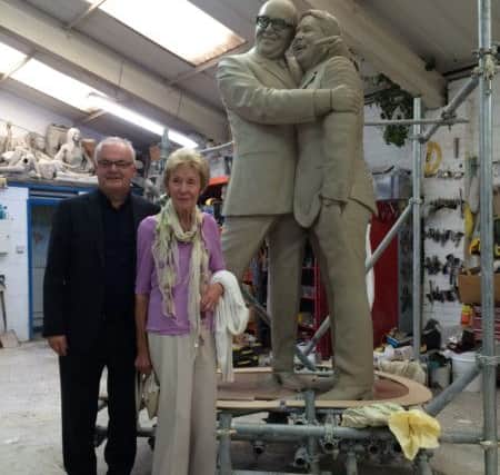 Eric Morecambe's son Gary and widow Joan visit the sculpture at Graham Ibbeson's workshop.