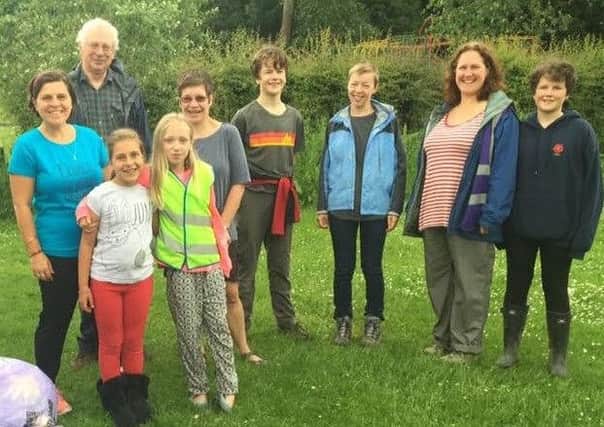Coun Abi Mills, second from right, with local residents and members of 16th Lancaster Scout Group.