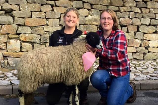 Liz Hoggarth, who bought the gimmer lamb, with Lisa Huddleston.