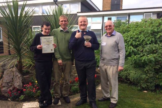 Morecambe Road School won the Visitor schools cup in Morecambe in Bloom. Pictured are George Wilkinson, Year 11 pupil, Horticulture tutor Ian Moorhouse, Year 11 pupil Cameron Hughes, and Michael Moorhouse from Morecambe in Bloom.