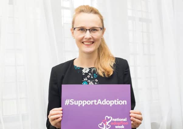 Cat Smith MP with a #SupportAdoption placard.