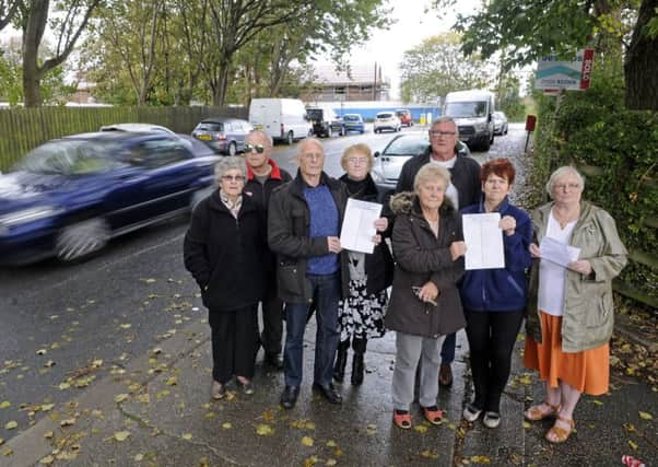 Barry Smith and other residents on Westcliffe Drive have signed a petition for double yellow lines on the road