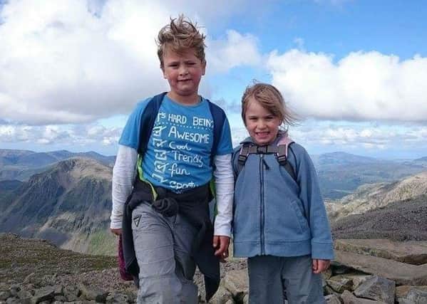 Josh, 8 and Phoebe Denby, 6,  from Heysham who are climbing Ingleborough Moutain in aid of St John's Hospice.