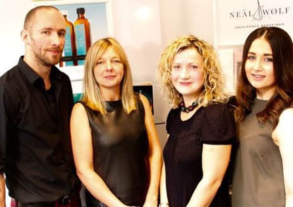Second from left, Tina Berry, manager at Heaton Hair in Lancaster with staff.