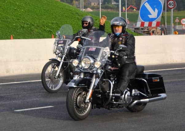 Members of the Red Rose Chapter Harley Davidson Club John Harding (front) and Frank Jacobs (rear) were the first bikers to use the new Heysham M6 link. Pic: Chris Coates.