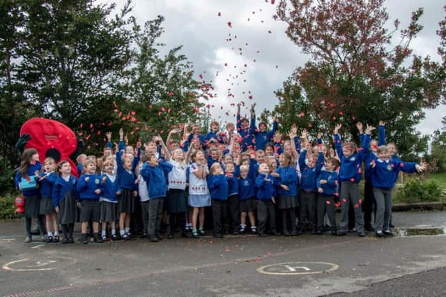 Schoolchildren of Silverdale St Johns CE school help launch Lancashire's Royal British Legion poppy appeal.