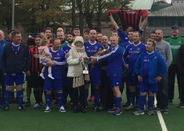 A charity football match between the Park and the Freeholders raised more than Â£1,200 for Dementia UK.