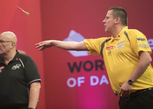 Dave Chisnall in action   .