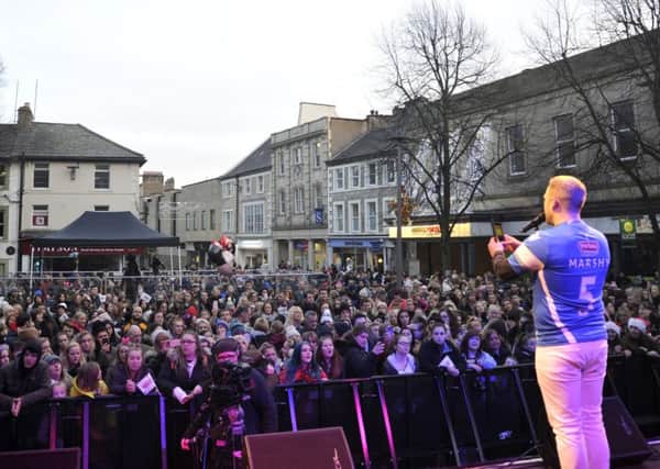 Stuart Michaels pays tribute to Neil Marshall as he performs at the Lancaster Christmas Lights switch-on.
