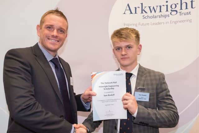 Sam Roskell receives his Arkwright Engineering Scholarship award.