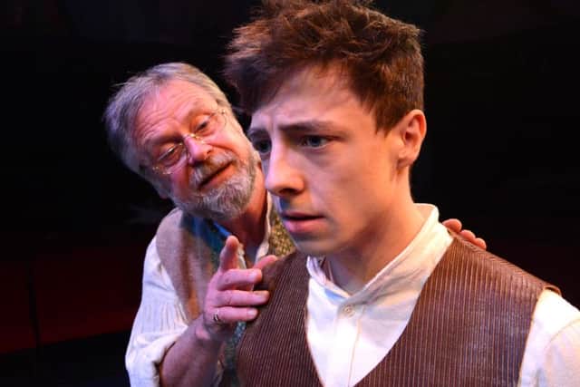 Russell Richardson as Jeppetto and Lucas Button as Pinocchio