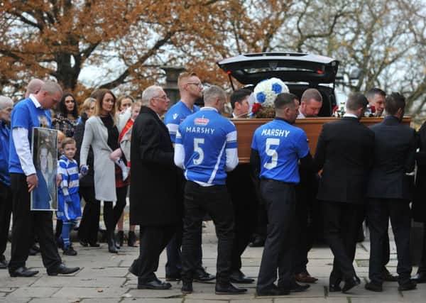 Friends and family at the funeral of former Lancaster City FC captain Neil Marshall at the Priory Church, Lancaster.